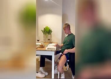 Under table footjob