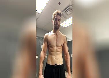 Gym dude flexes