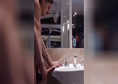 sexy boy hard big cock making pee