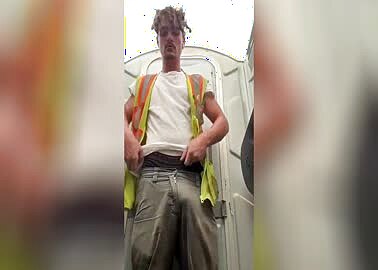 Tradie showing off his hard cock  asshole in the porta potty
