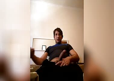 Trying the condom on the hard dick