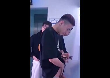 Chinese drunk at the urinal