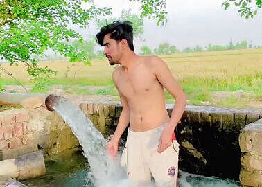 Tubewell Bathing in Pakistani Village