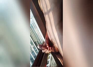 Hot Guy Big Dick Masturbating in Public in Front of the Window